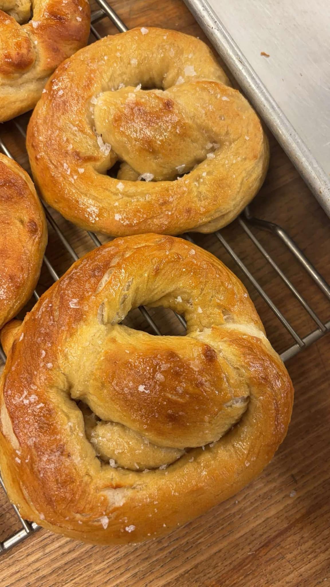 Soft pretzels with deep mahogany crust and flaked sea salt